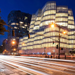 architecture photography: InterActiveCorp's headquarters (IAC building) at the blue hour and designed by architect Frank Gehry located at 550 West 18th Street on the corner of Eleventh Avenue in the Chelsea neighborhood of Manhattan, New York City, NYC