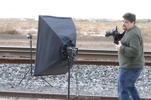Setting up on the tracks for a shot of Christina, Jim takes a call.
