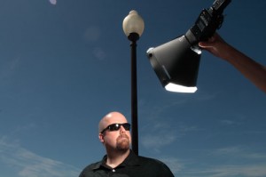 SpeedLightProKit used to light up subject against the sun, later removed in Photoshop