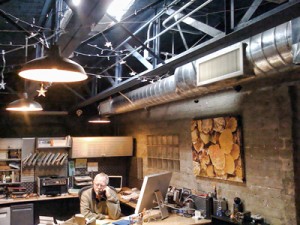 Ken at work in his office which overlooks the studio from the second story.