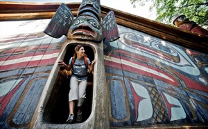 Agnes Stowe explores the clan house at Totem Bight State Park near Ketchikan, Alaska August 2009.  The state park is home to 14 restored totems salvaged from nearby villages.