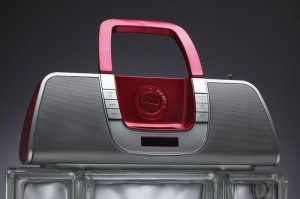 This shiny, colorful iPod boom-box presents several challenges to the product photographer.